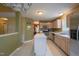Bright eat-in kitchen featuring stainless steel appliances, kitchen island, and lots of cabinets at 203 Halls Mill Dr, Cary, NC 27519
