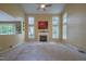 Bright living room featuring vaulted ceilings, a fireplace, and an open floor plan at 203 Halls Mill Dr, Cary, NC 27519