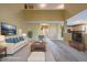 Spacious living room featuring high ceilings, plush carpet, and seamlessly connect to other areas of the home at 203 Halls Mill Dr, Cary, NC 27519