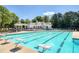 Sparkling community pool, surrounded by lounge chairs, perfect for swimming and relaxation at 203 Halls Mill Dr, Cary, NC 27519