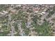 An aerial view of the neighborhood with tree-lined streets and several community buildings nearby at 2309 Chautauqua Ave, Durham, NC 27707