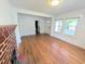 Bright living room boasting hardwood floors, fireplace, and natural light streaming through the windows at 2309 Chautauqua Ave, Durham, NC 27707