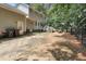 A spacious backyard features a well-maintained lawn and a charming deck, perfect for outdoor relaxation and entertainment at 2312 Brasswynd Ct, Fuquay Varina, NC 27526