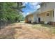 A big backyard is enclosed with a fence and features a shed, perfect for storage and recreational activities at 2312 Brasswynd Ct, Fuquay Varina, NC 27526