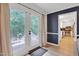 Sunroom showcasing french doors with view of back patio and access to kitchen at 2312 Brasswynd Ct, Fuquay Varina, NC 27526