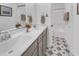 Elegant bathroom with a double vanity, sleek mirrors, and a shower-tub combination at 2371 Old Us 421, Lillington, NC 27546