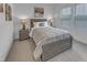 Bedroom with soft carpet, and two bedside tables with lamps and natural light at 2371 Old Us 421, Lillington, NC 27546