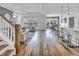 Open-concept design seamlessly connecting the living room, kitchen, and dining area, perfect for entertaining at 2371 Old Us 421, Lillington, NC 27546