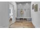 Hallway with built-in storage, coat hooks, and attached half bathroom at 2371 Old Us 421, Lillington, NC 27546