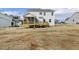 New home featuring a backyard with wood deck and view of other homes in the community at 25 Long Needle Ct # 37, Youngsville, NC 27596