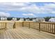 New home featuring a backyard with wood deck and view of other properties at 25 Long Needle Ct # 37, Youngsville, NC 27596
