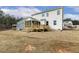 New home featuring a backyard with wood deck and view of other homes in the community at 25 Long Needle Ct # 37, Youngsville, NC 27596
