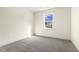 Bedroom offers neutral carpet and a view of the neighborhood at 25 Long Needle Ct # 37, Youngsville, NC 27596