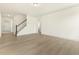 Open foyer showcases stairs and wood floors at 25 Long Needle Ct # 37, Youngsville, NC 27596