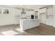 Modern kitchen featuring a large island, stainless steel appliances, and ample cabinet space at 25 Long Needle Ct # 37, Youngsville, NC 27596