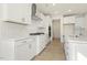 Beautiful kitchen with stainless steel appliances, herringbone tile backsplash, and ample cabinet space at 25 Long Needle Ct # 37, Youngsville, NC 27596