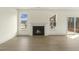 Bright living room features a fireplace and access to the patio at 25 Long Needle Ct # 37, Youngsville, NC 27596