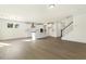 Open concept living area with kitchen and staircase at 25 Long Needle Ct # 37, Youngsville, NC 27596