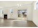 Bright living room with fireplace and access to screened in porch at 25 Long Needle Ct # 37, Youngsville, NC 27596