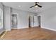 Neutral bonus room featuring hardwood floors, recessed lighting, and multiple doorways at 2521 Newbold St, Raleigh, NC 27603