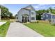Inviting two-story home with a spacious driveway and well-maintained lawn, perfect for families at 2521 Newbold St, Raleigh, NC 27603