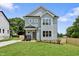 Beautiful two-story home with a manicured lawn, highlighting its classic design and curb appeal at 2521 Newbold St, Raleigh, NC 27603