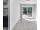 Bright dining area with a sliding glass door leading to the backyard deck, offers natural light at 2705 Ramblegate Ln, Durham, NC 27705
