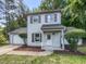 Charming two-story home with light siding, landscaped yard, and an attached garage, great curb appeal at 2705 Ramblegate Ln, Durham, NC 27705