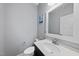Stylish powder room featuring a sleek vanity and modern fixtures at 2909 Landon Pines Ct, New Hill, NC 27562