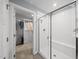 Modern bathroom shower with glass doors and a built-in bench at 2909 Landon Pines Ct, New Hill, NC 27562