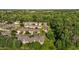 Aerial view of a suburban neighborhood with diverse landscaping, manicured lawns, and well-maintained exteriors at 3027 Maple Ave # U1, Burlington, NC 27215