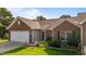 Charming single-story brick home with attached garage and a well-manicured front yard at 3027 Maple Ave # U1, Burlington, NC 27215