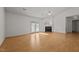 Bright living room boasts hardwood floors, a fireplace and access to the outdoors at 3027 Maple Ave # U1, Burlington, NC 27215