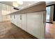 Close-up view of a spacious island with modern cabinetry, ample storage, and a sleek countertop, blending style and function at 3205 Broyhill Cir, Raleigh, NC 27604
