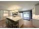 Modern island kitchen featuring an expansive countertop with bar stool seating, perfect for casual dining and entertaining at 3205 Broyhill Cir, Raleigh, NC 27604