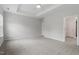 Spacious bedroom with plush carpet, a ceiling fan, and neutral paint at 33 Black Walnut Dr # 185, Garner, NC 27529