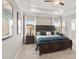 Serene main bedroom with a tray ceiling, a ceiling fan, and elegant furniture sets a calming tone at 334 Deodora Ln, Cameron, NC 28326