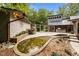 This backyard offers an outdoor kitchen and unique in-ground pond at 343 Lakewood Pointe Dr, Roxboro, NC 27574