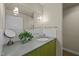 Stylish bathroom with a modern sink, wall mounted faucet and sleek mirror at 343 Lakewood Pointe Dr, Roxboro, NC 27574