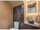Modern bathroom with granite countertop, vessel sink, updated fixtures and custom tile accents at 343 Lakewood Pointe Dr, Roxboro, NC 27574