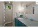 Well-lit bathroom with a modern vanity, sink and stylish fixtures at 343 Lakewood Pointe Dr, Roxboro, NC 27574