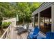 Relax on this beautiful deck overlooking a serene wooded landscape at 343 Lakewood Pointe Dr, Roxboro, NC 27574