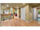 Spacious open floor plan with hardwood floors, modern staircase, and ample natural light at 343 Lakewood Pointe Dr, Roxboro, NC 27574
