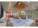Open living area showcasing the kitchen, living room and staircase at 343 Lakewood Pointe Dr, Roxboro, NC 27574