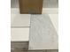 Material samples showcasing cabinet, countertop, backsplash, and flooring options at 355 Chesapeake Cmns St # 112, Garner, NC 27529