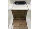 Interior design showcases brown cabinets, white countertops, and luxury vinyl flooring at 363 Chesapeake Cmns St # 114, Garner, NC 27529