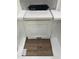 Interior design elements include white cabinets, countertops, and luxury vinyl flooring at 363 Chesapeake Cmns St # 114, Garner, NC 27529