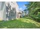Well maintained lawn and natural wooded privacy screen make the back yard a peaceful retreat at 4009 Patriot Ridge Ct, Raleigh, NC 27610