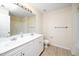 Large bathroom vanity with double sinks and a large mirror at 4009 Patriot Ridge Ct, Raleigh, NC 27610