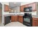 Kitchen with black appliances at 4009 Patriot Ridge Ct, Raleigh, NC 27610